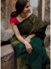 Pretty Dark Green Colored Festive Wear Woven Art Silk Saree