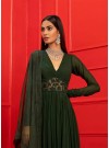 Dark Green Anarkali Gown With V-neckline, Handwork panel at the waist and full sleeves.