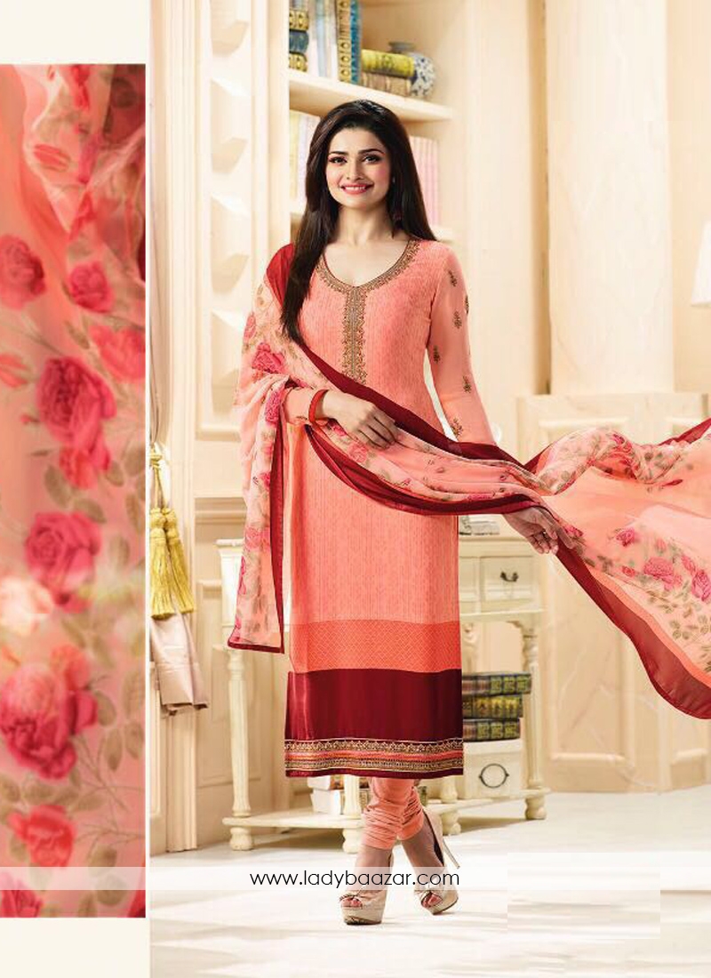 Arresting Embroidery Work Orange Churidar Salwar Suit