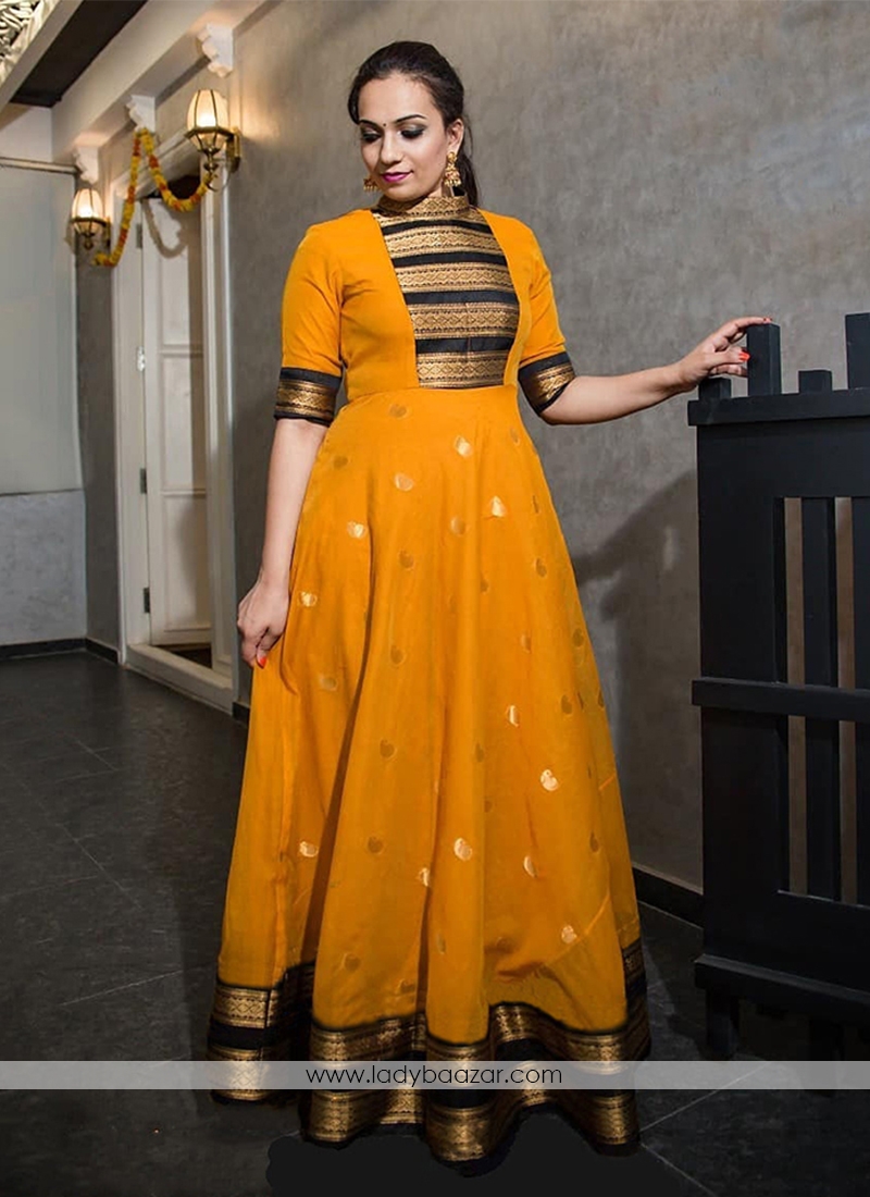 Classy Mustard Colored Party Wear Silk Jacquard Weaving Work Gown