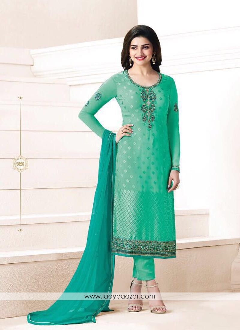 Dazzling Brasso Green Embroidery Churidar Dress