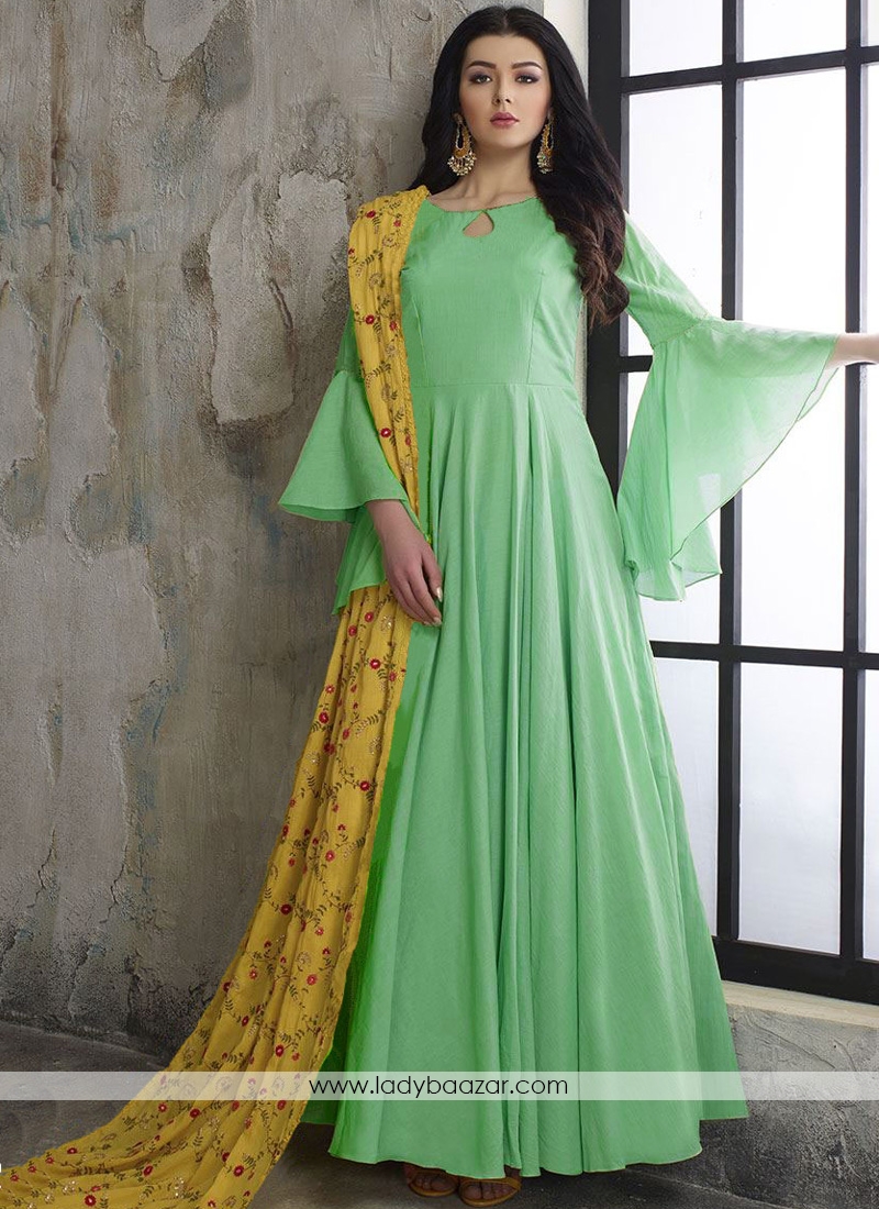 Demure pastel green designer wear long dress With Embroidered Dupatta