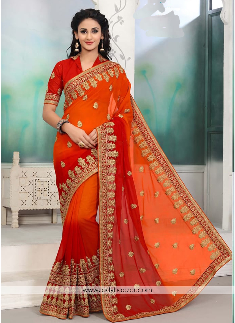 Dignified Embroidery Work Orange Half N Half Saree