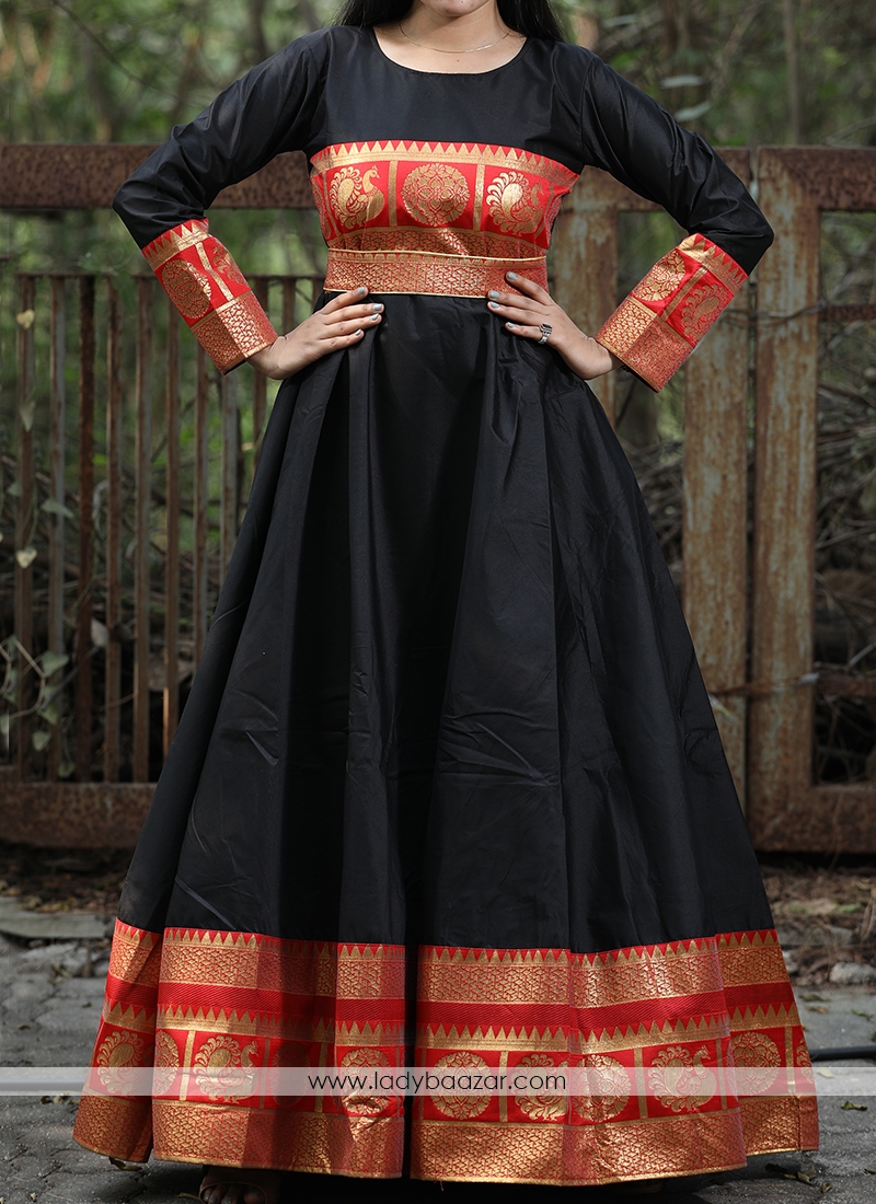 Flattering Black Colored Festive Wear Woven Tapetta Silk Gown