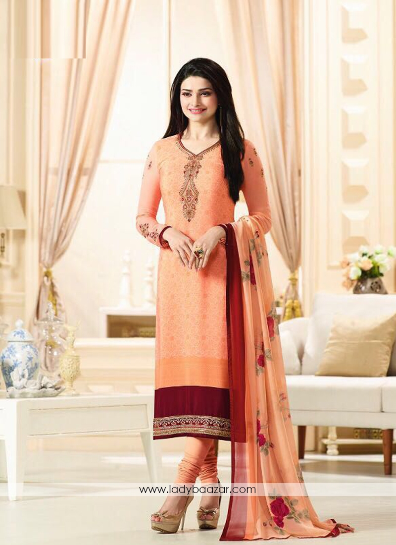 Glowing Embroidery Work Orange Churidar Suit